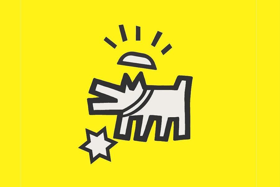 Black outline of a dog with a Yamaka and a Star of David on a yellow background