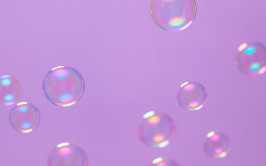 Decorative image of bubbles on a purple background