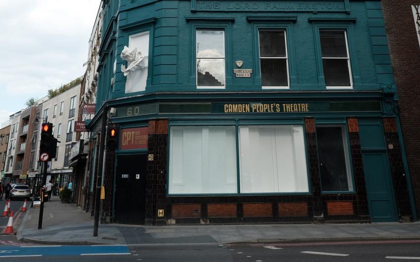 A photo of CPT, the street view of the theatre - two big glass windows can be seen. 