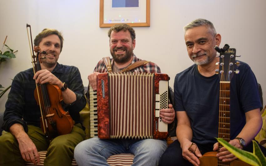 Photo of Paul Burgess, Dan Cox and Andy Bannister (left to right) by Tasnim Siddiqa Amin at a rehearsal in Deptford 2026