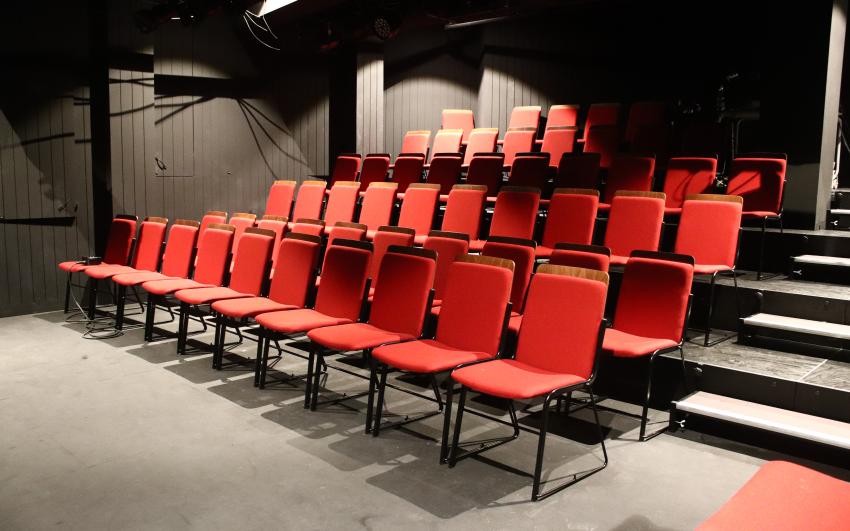 A photo of the new red seating bank in the theatre
